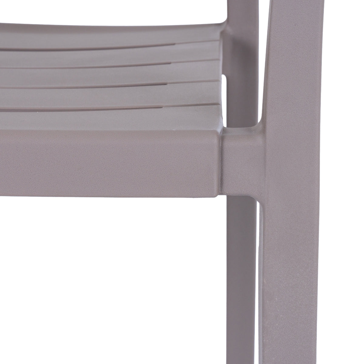 Close-up of the grey chair's slatted seat and front leg, showing the fine pebbled texture of the matte surface.