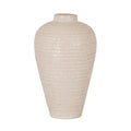 Cream vase on a white background, with a short open neck, rounded shoulders and rows of tan-accented rectangular impressions down its tapered body.