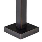 Close-up of the lamp's square base and lower stem, showing the dark textured finish and fine warm-toned edging.