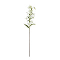Full view of an artificial flower spray with a long brown stem, branching white recurved blooms, hanging buds and narrow green leaves against white.