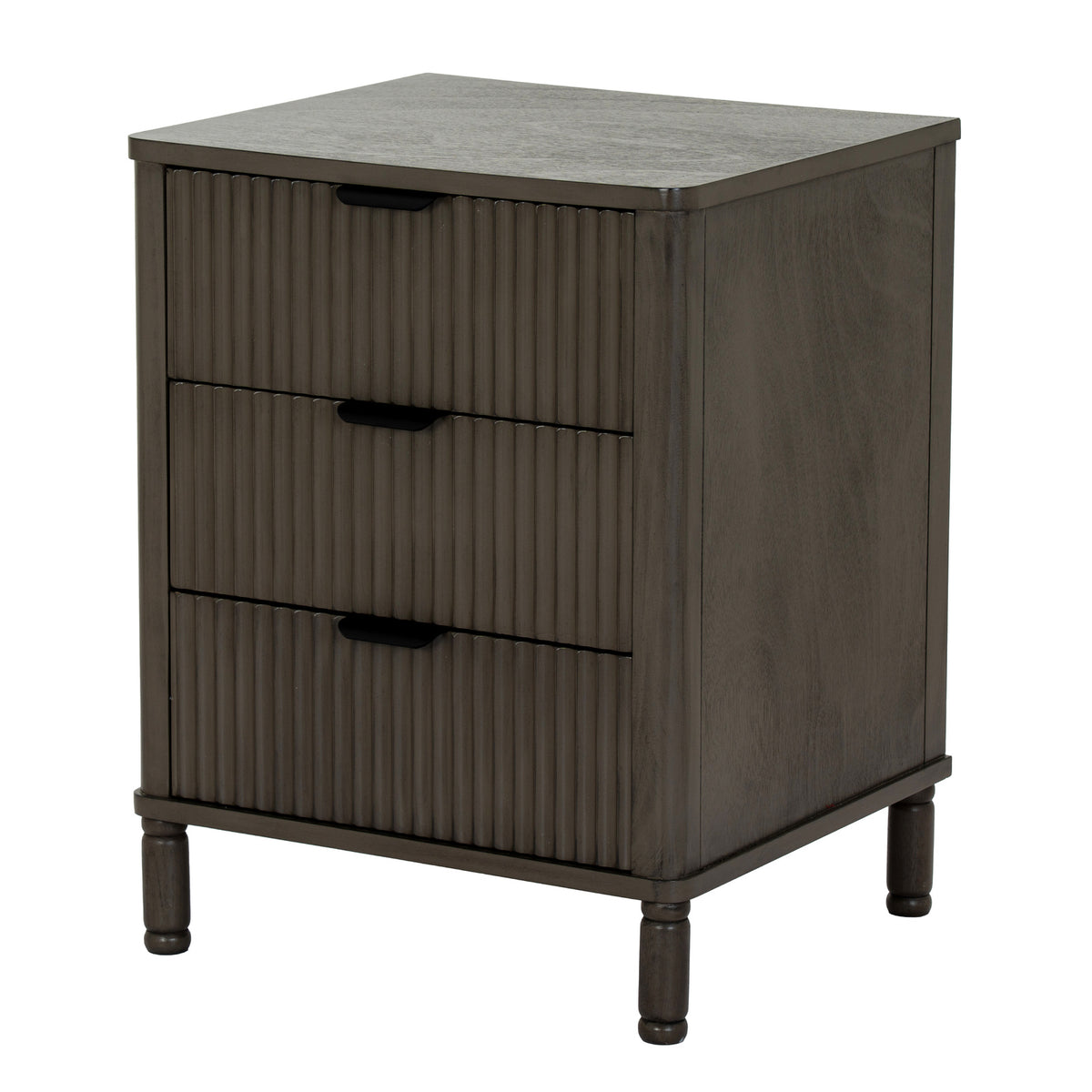 Angled view of the dark grey-brown bedside table showing three reeded drawer fronts, dark cup pulls, a plain side panel and short shaped feet.