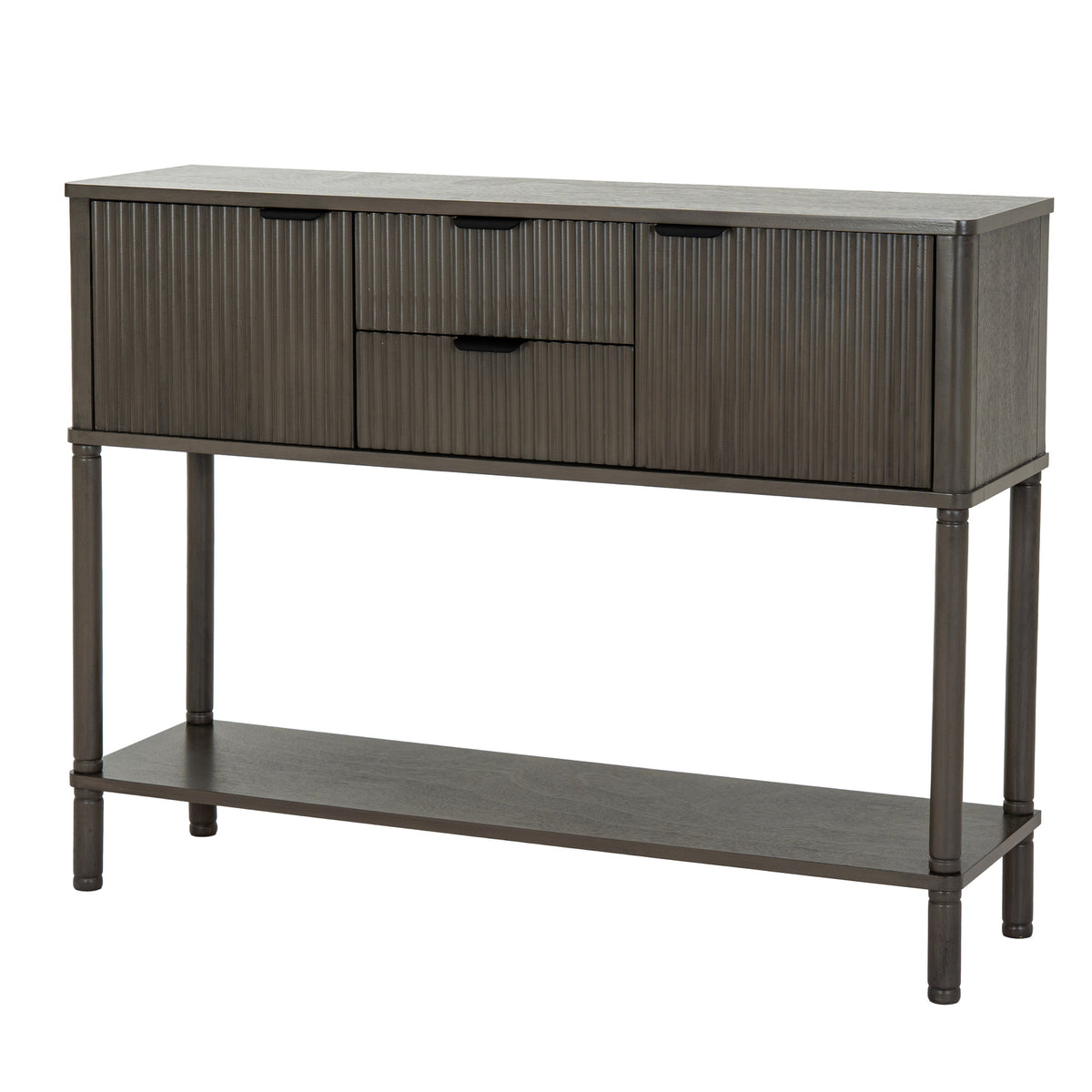 Angled view of a dark grey-brown console table with two reeded cupboard doors, two central drawers, dark cup-shaped pulls and a full-width lower shelf.