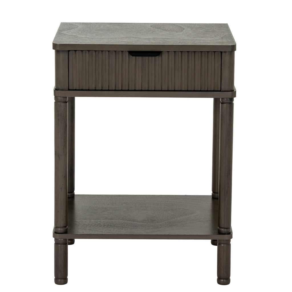 Front view of the Reed & Cup Side Table with a centred dark cup pull, vertical reeding and four turned-profile legs around an open shelf.