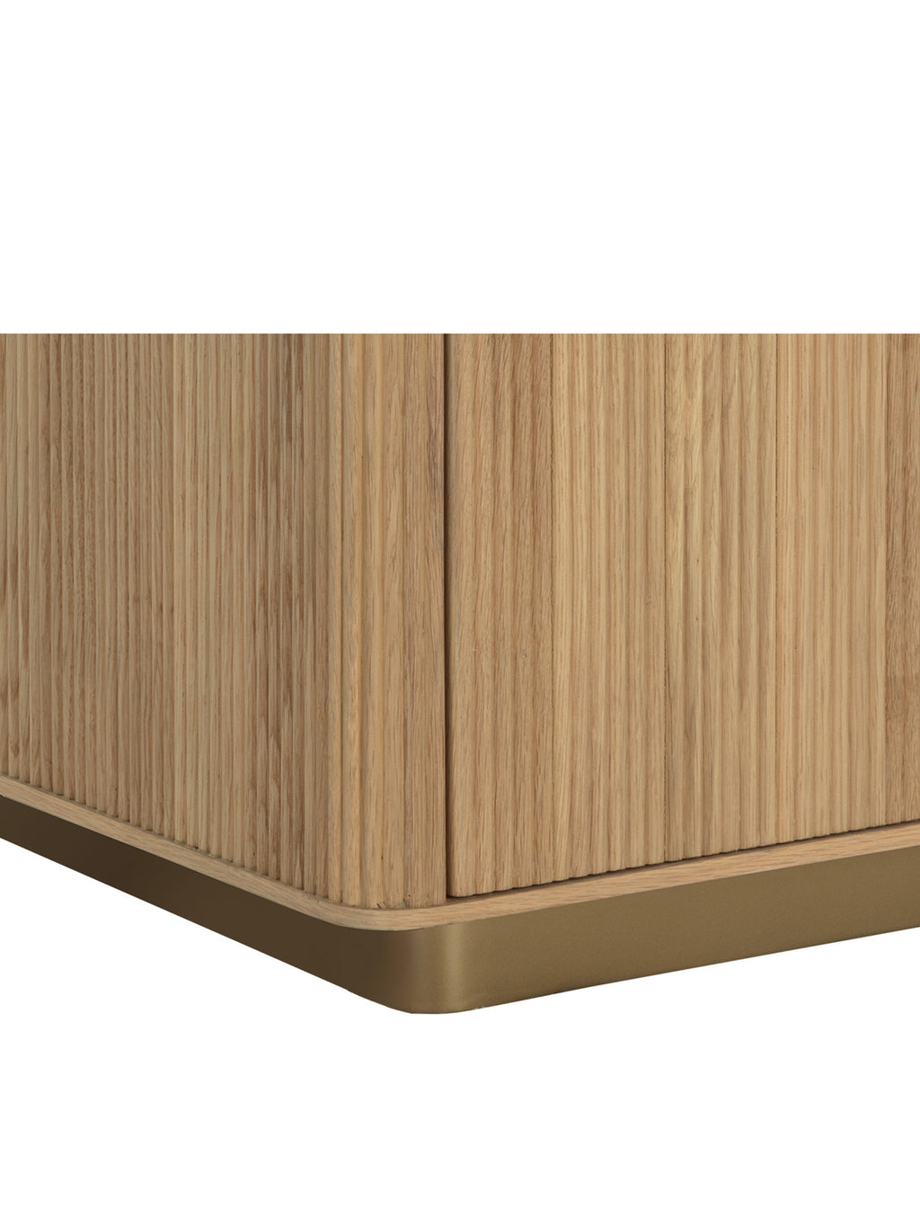 Detail of the nightstand's reeded wood panels and rounded lower corner above the gold-toned base.