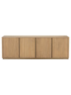 Front view of the Reedline Sideboard with four vertically reeded oak doors and a slim gold-coloured base.