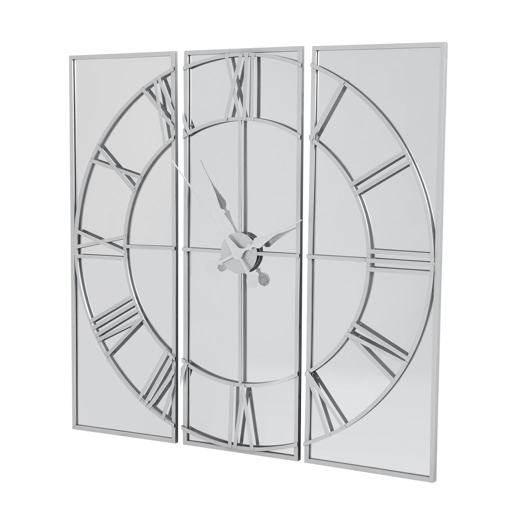 Angled view of the Reflected Dial Wall Clock, with a silver-toned Roman-numeral dial spanning three tall mirrored panels.