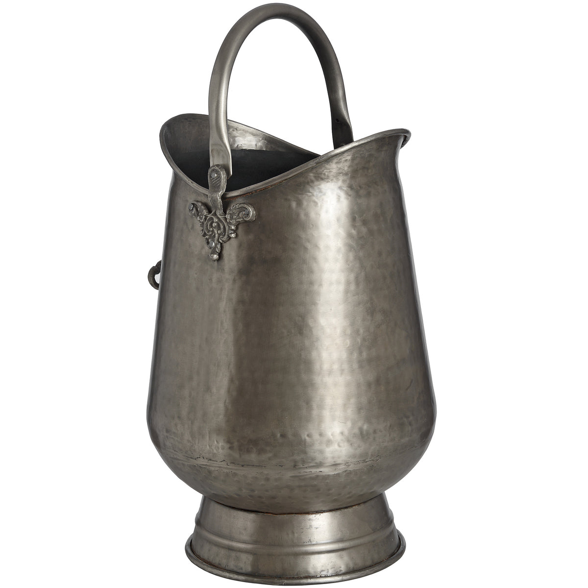 Coal bucket from the opposite angle, with a broad dimpled body, raised scroll detail beneath the handle and a dark open interior.