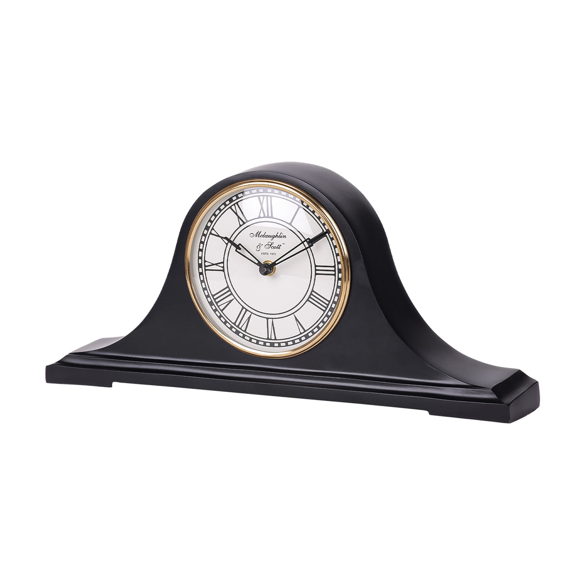 Angled view of the table clock showing the depth of its domed black case and broad stepped base.
