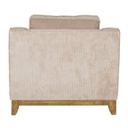 Rear view of the armchair showing the cream ribbed back, the back cushion above it, and a brown lower rail between the feet.