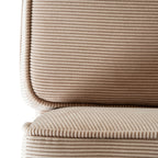 Detail of a cream back cushion above a seat cushion, showing the ribbed surface and rounded edged corner.