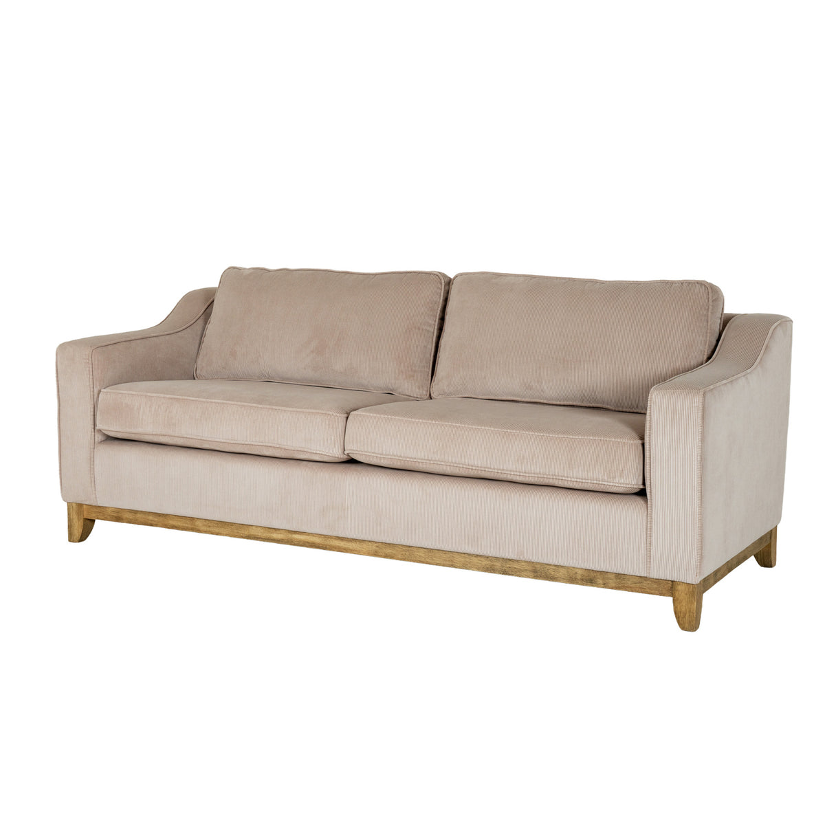 Three-quarter view of the Rib & Rail Sofa, showing cream ribbed upholstery, broad cushions and exposed brown lower rails.