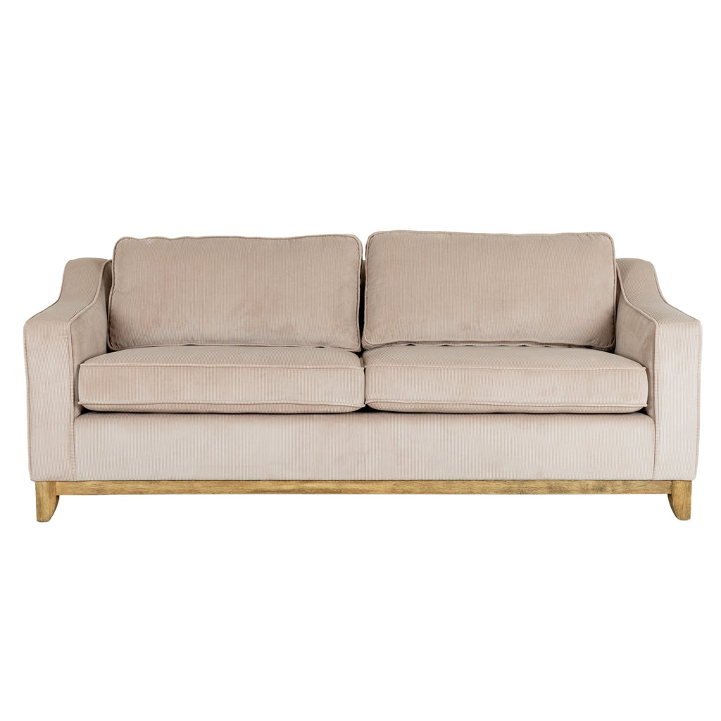 Front view of the cream sofa with two seat cushions, two back cushions and a brown rail across the base.