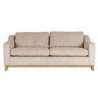 Front view of the cream sofa with two seat cushions, two back cushions and a brown rail across the base.