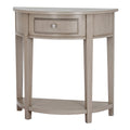 Front view of the pale grey-beige half-moon console table, showing its curved drawer, silver-coloured knob, four square legs and low shelf.