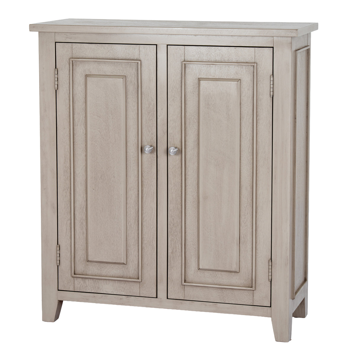 Angled front view of a pale grey-beige hall cabinet with two moulded doors, ribbed silver-coloured knobs, a framed right side panel and short square feet.