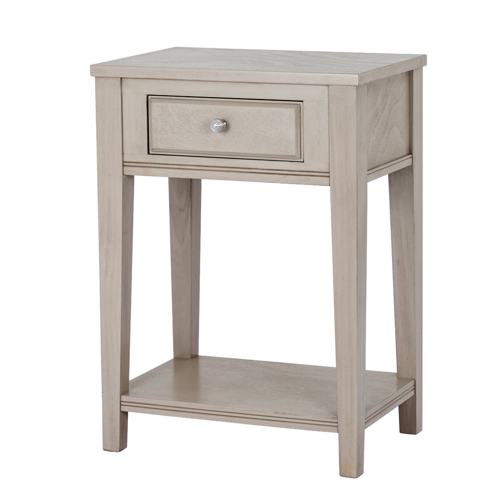 Front three-quarter view of the pale grey-beige side table, showing its framed drawer, ribbed silver-coloured knob and open lower shelf.