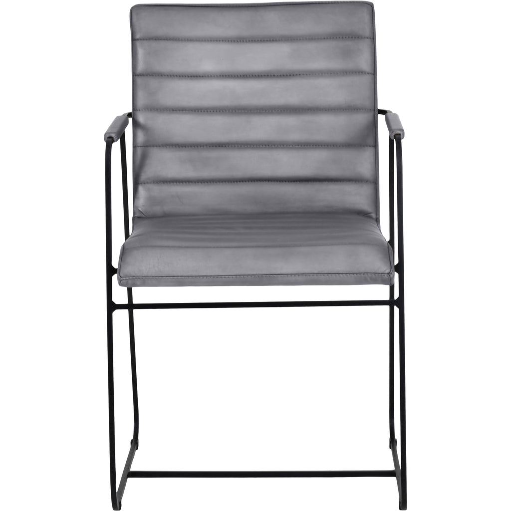 Front view of a grey leather dining armchair with a horizontally ridged back, upholstered armrests and slim black metal frame.