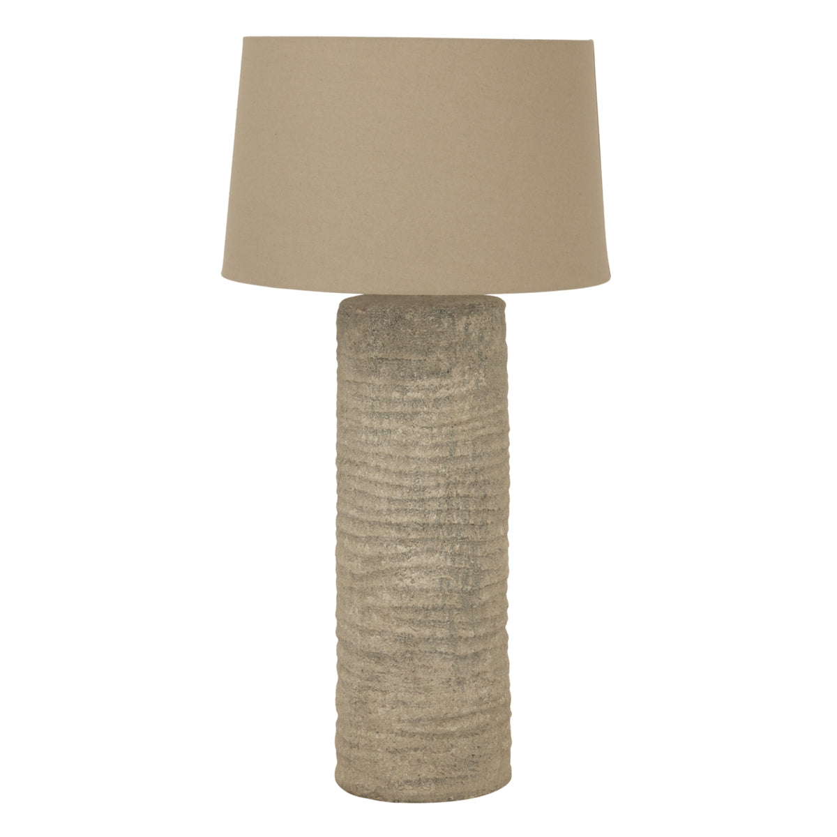 Full view of a table lamp with a tall ridged grey-beige cylinder base and broad tapered beige shade against white.