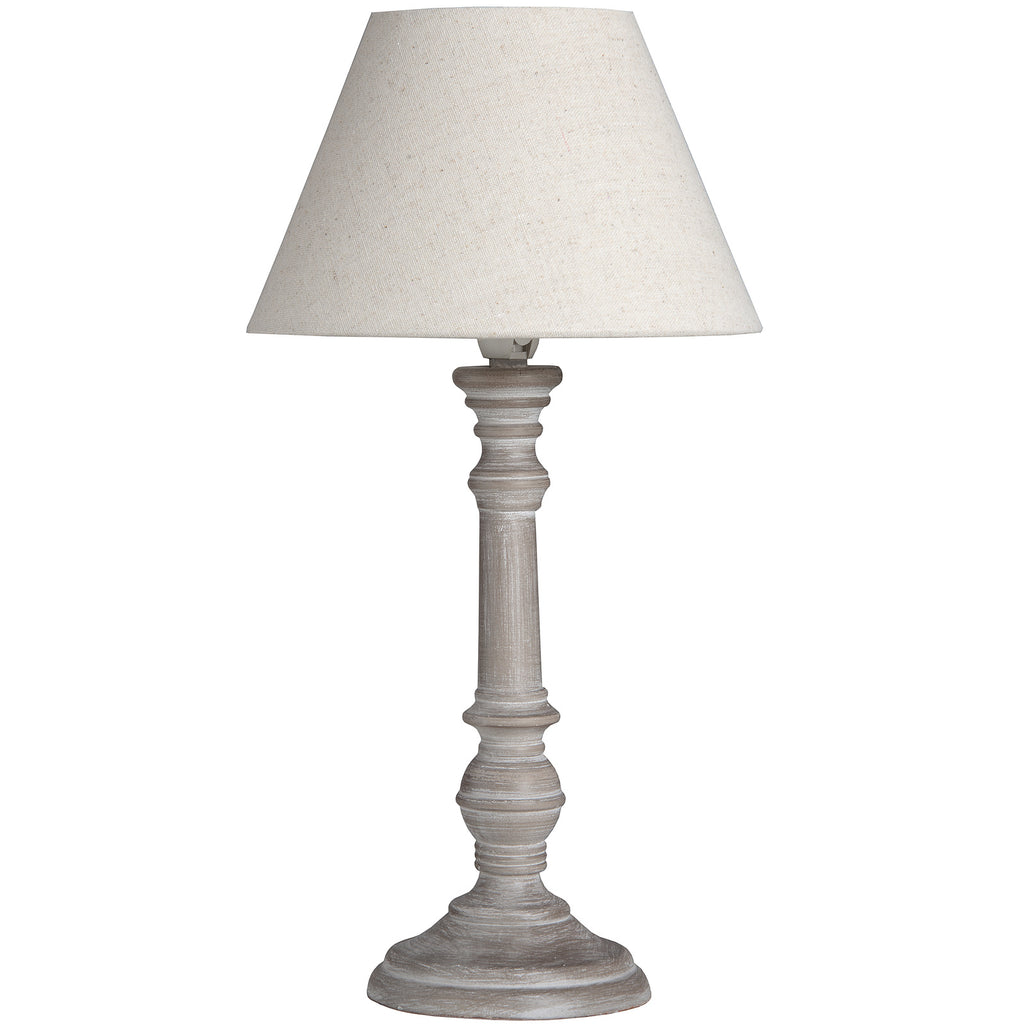 Ring & Bulb Table Lamp with a light tapering shade, grey-brown turned base and circular foot against white.