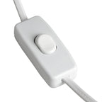White inline rocker switch on the lamp's white flex against a white background.