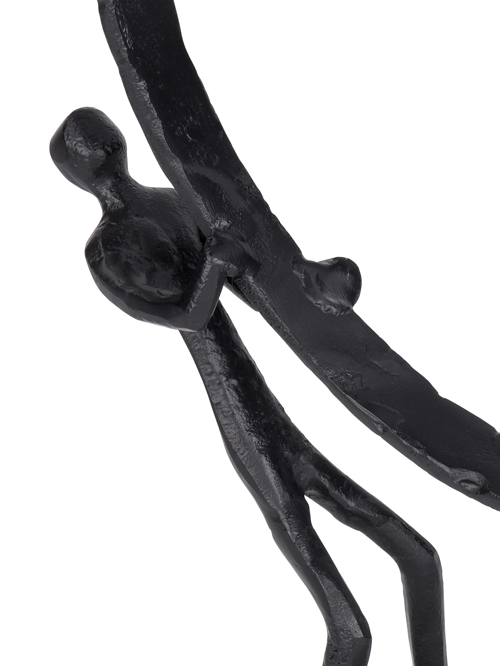 Close-up of one figure gripping the ring, showing the textured black surface and elongated body.