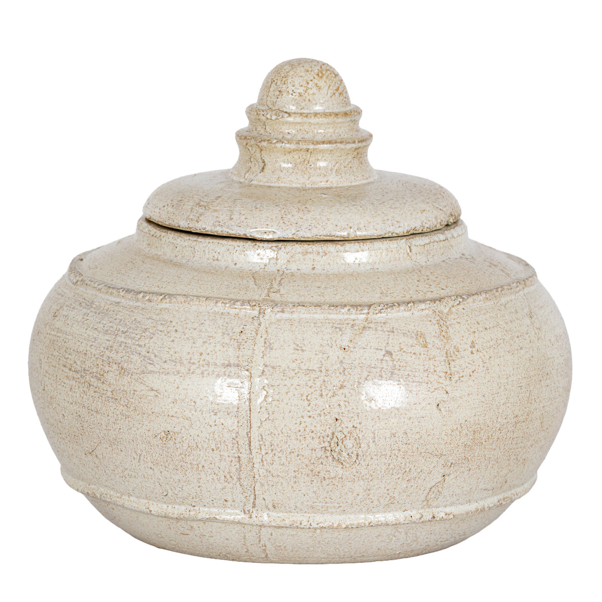 Cream decorative pot with its lid in place, showing a rounded body, raised bands and a domed ringed finial against white.