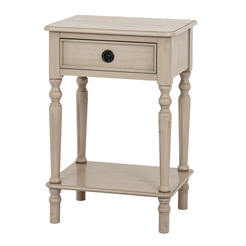 Ringline Side Table viewed from the front at an angle, showing its pale finish, framed drawer, black ring pull and lower shelf.