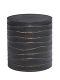 Black round drum side table with wavy horizontal ridges traced in brass-coloured paint, shown against white.