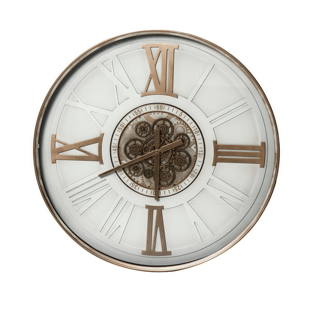 Front view of a round white wall clock with antique gold-toned Roman numerals, hands and exposed cog detailing at the centre.