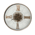 Front view of a round white wall clock with antique gold-toned Roman numerals, hands and exposed cog detailing at the centre.