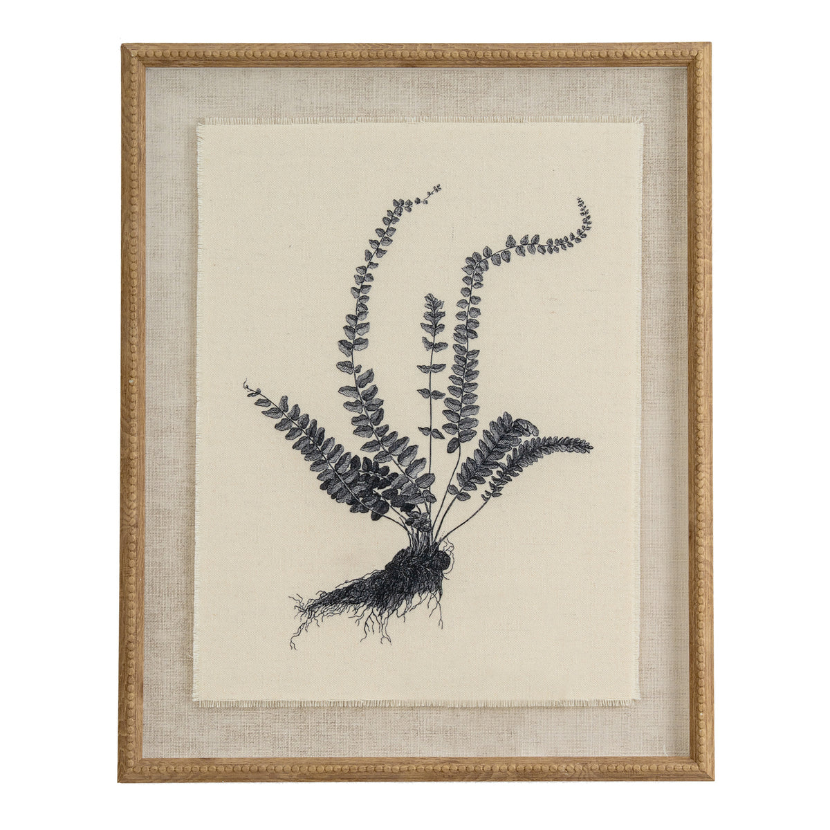 Front view of a portrait fern print showing dark curling fronds and exposed roots on a pale textured ground within a tan-gold beaded frame.