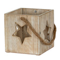 Three-quarter view of the pale washed square candle holder, with star cut-outs and a rope loop draped across the front corner.