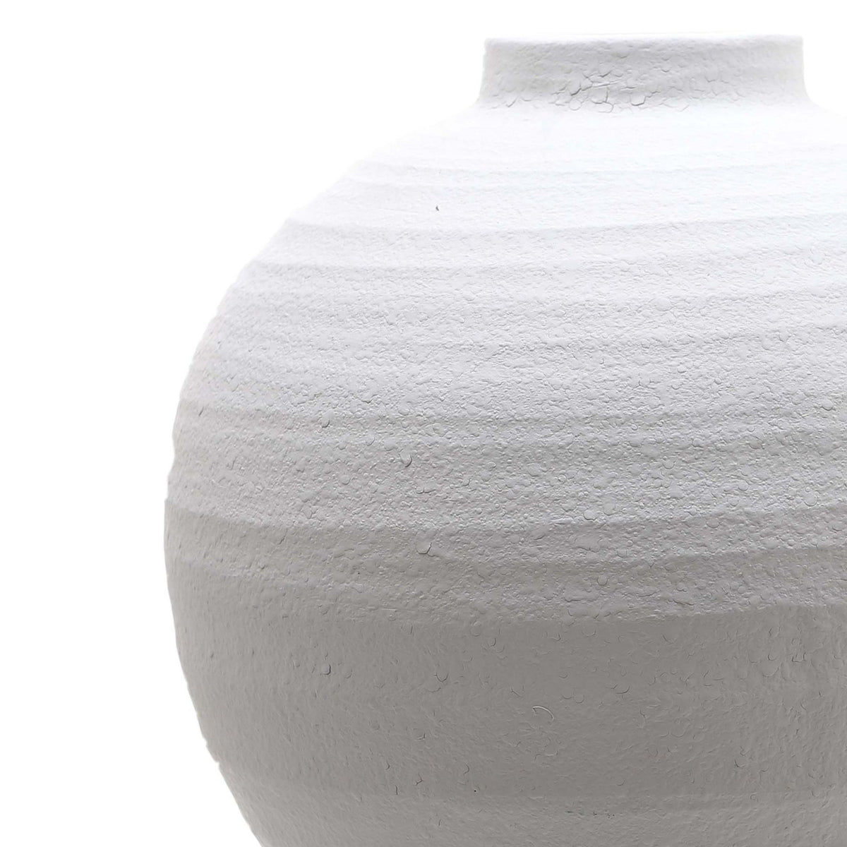 Close-up of the white vase's short neck and curved shoulder, showing the fine rough texture and shallow horizontal bands.
