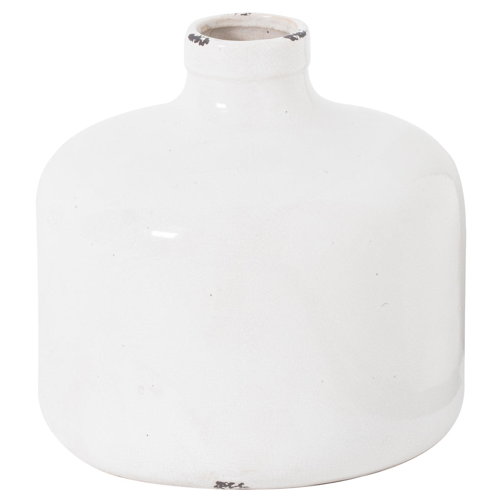 White round vase with broad curved shoulders, a short neck and dark worn-looking patches on the rim and base.
