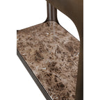 Close-up of the brown marble base shelf, showing pale veining and its rounded corner within the iron frame.
