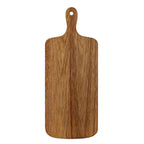 Full face of the brown grained rectangular serving board, with rounded corners and a narrow curved handle with a circular hole.