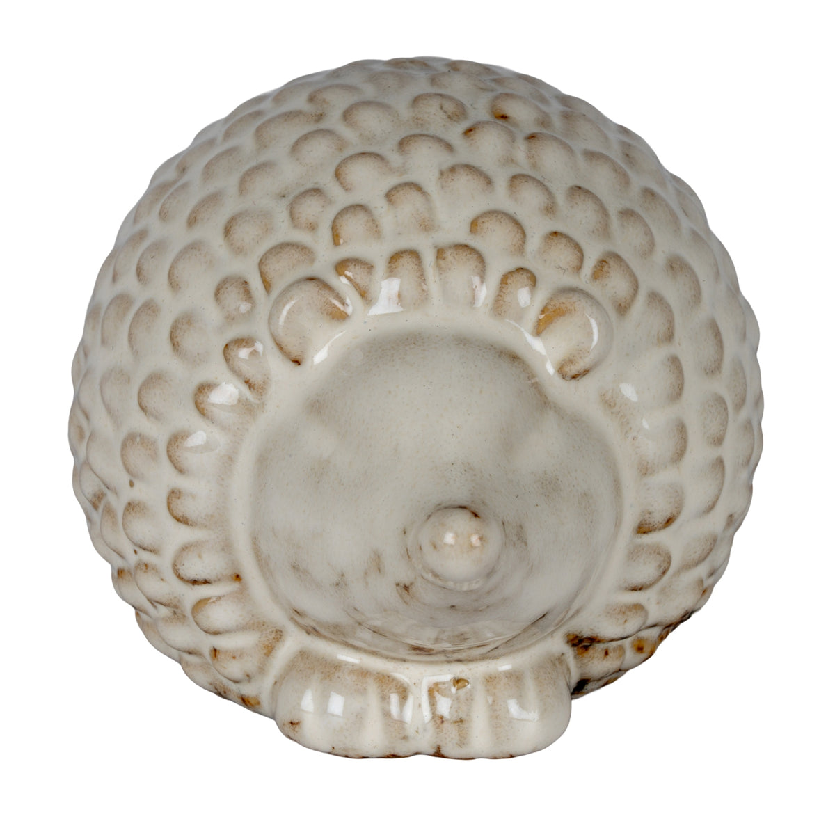 Front view of the rounded hedgehog decoration, showing its central nose, small ears and cream scales edged with brown shading.