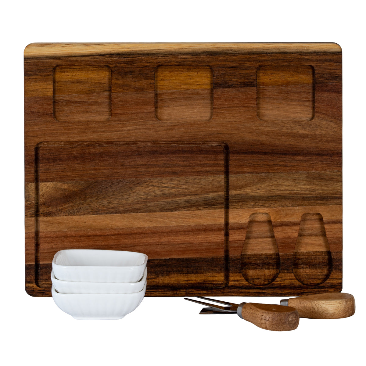 Front view of the board showing three empty rounded-square bowl wells and two shaped utensil recesses, with white bowls stacked and utensils arranged in front.