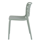 Side view of the green-grey dining chair, showing the curve of its back panels, shallow seat and slightly splayed legs.