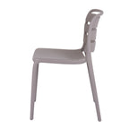 Side view of the grey dining chair showing the curved back panels, shallow seat and slightly splayed legs.