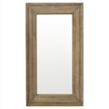 Front view of the tall rectangular wall mirror with a broad moulded brown frame and pale rubbed markings.