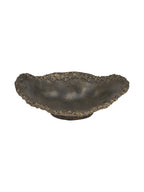 Dark bronze decorative bowl viewed from above at an angle, showing its shallow interior and irregular textured rim.