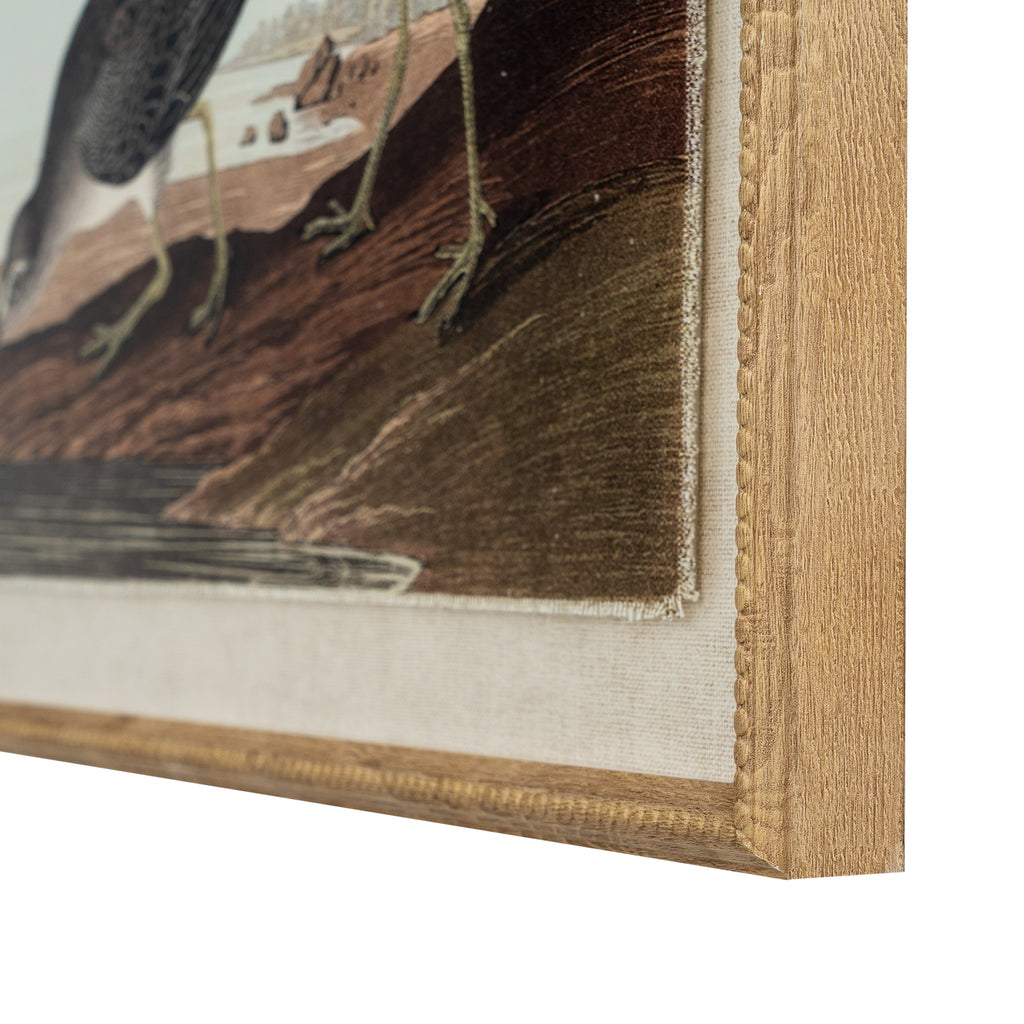 Angled close-up of the print's lower right corner, showing the birds' feet, textured pale border and grain-like tan-gold frame with beaded trim.