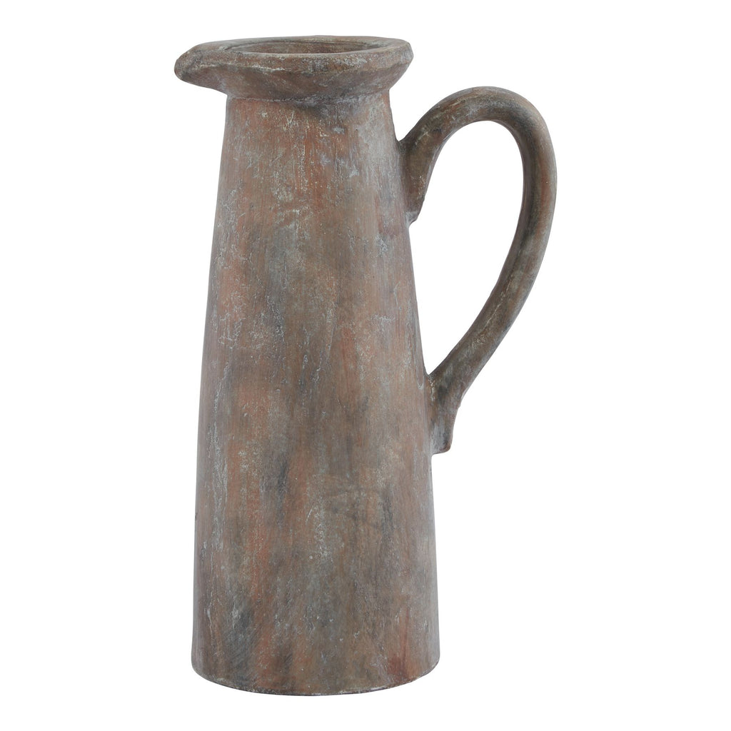 Tall rust-brown decorative jug with a tapered body, flared rim and large curved handle against a white background.