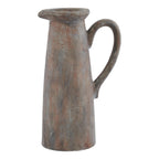 Tall rust-brown decorative jug with a tapered body, flared rim and large curved handle against a white background.