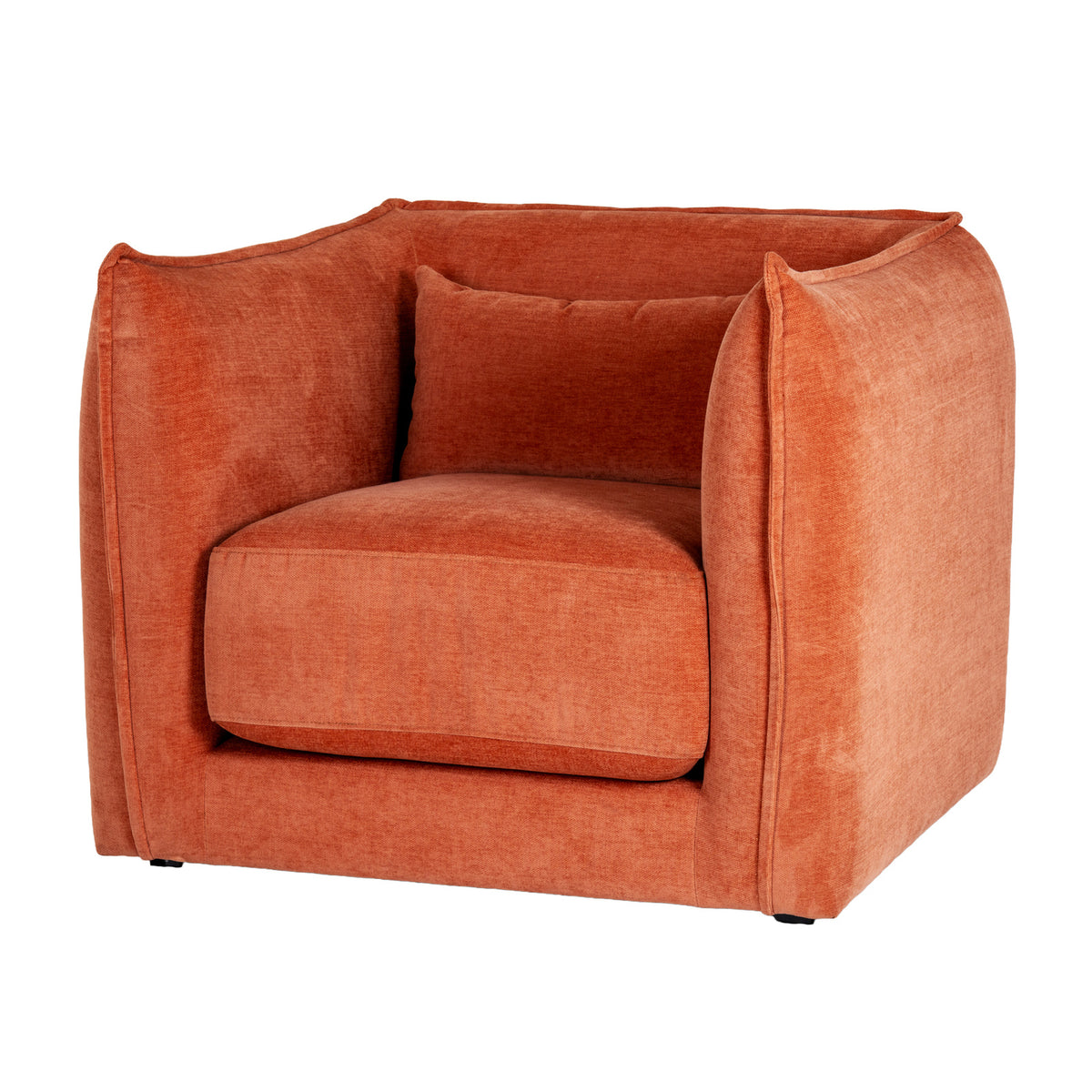 Three-quarter front view of a rust-orange armchair with rounded enclosing sides, a thick seat cushion and a matching rectangular cushion.