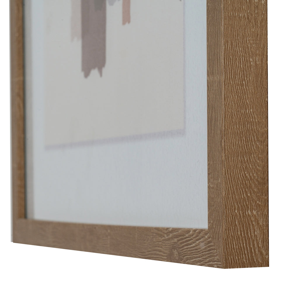 Angled close-up of the artwork's lower right frame corner, showing the brown grain pattern and pale mount around the abstract image.