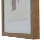 Angled close-up of the artwork's lower right frame corner, showing the brown grain pattern and pale mount around the abstract image.