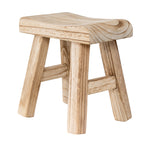 Angled view of the stool showing the thick rounded seat corner, sweeping darker grain and crossbars between the legs.