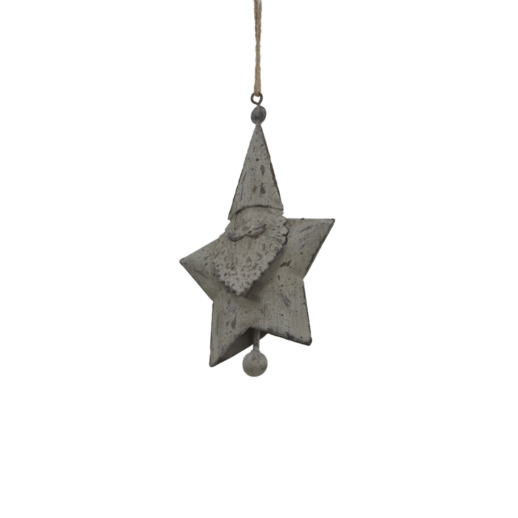 Angled close-up of the Santa star decoration showing the raised face, curled moustache, patterned beard and dark marks across the grey finish.